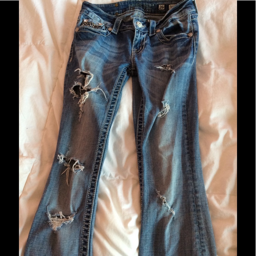 Fitting miss me jeans. Light colored and holes