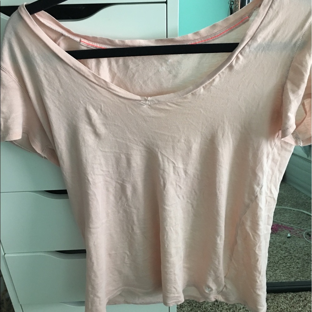light pink American eagle shirt