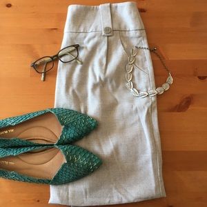 Professional, pleated, pocketed, pale blue skirt