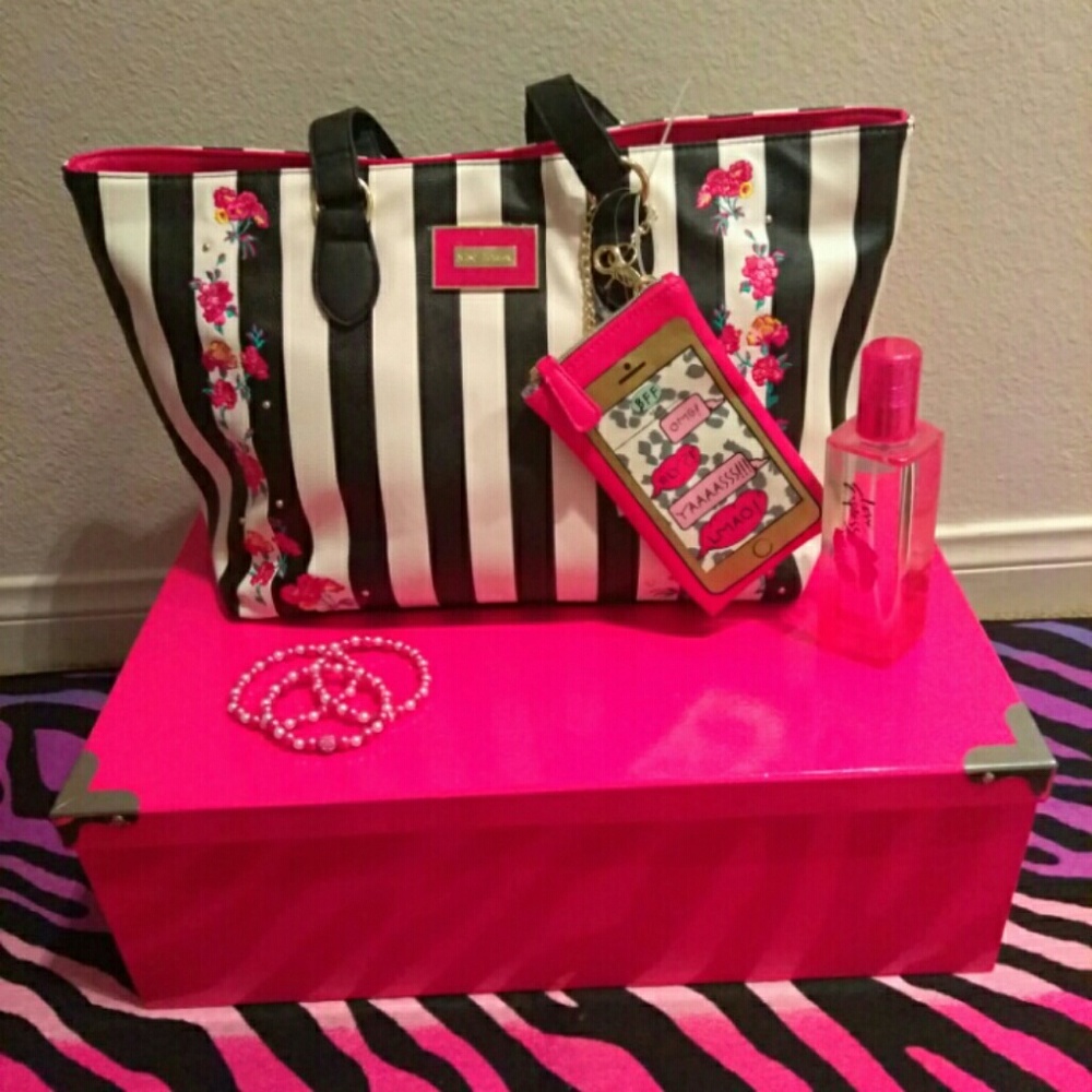 SOLD..... Betsey Johnson stripe floral handbag