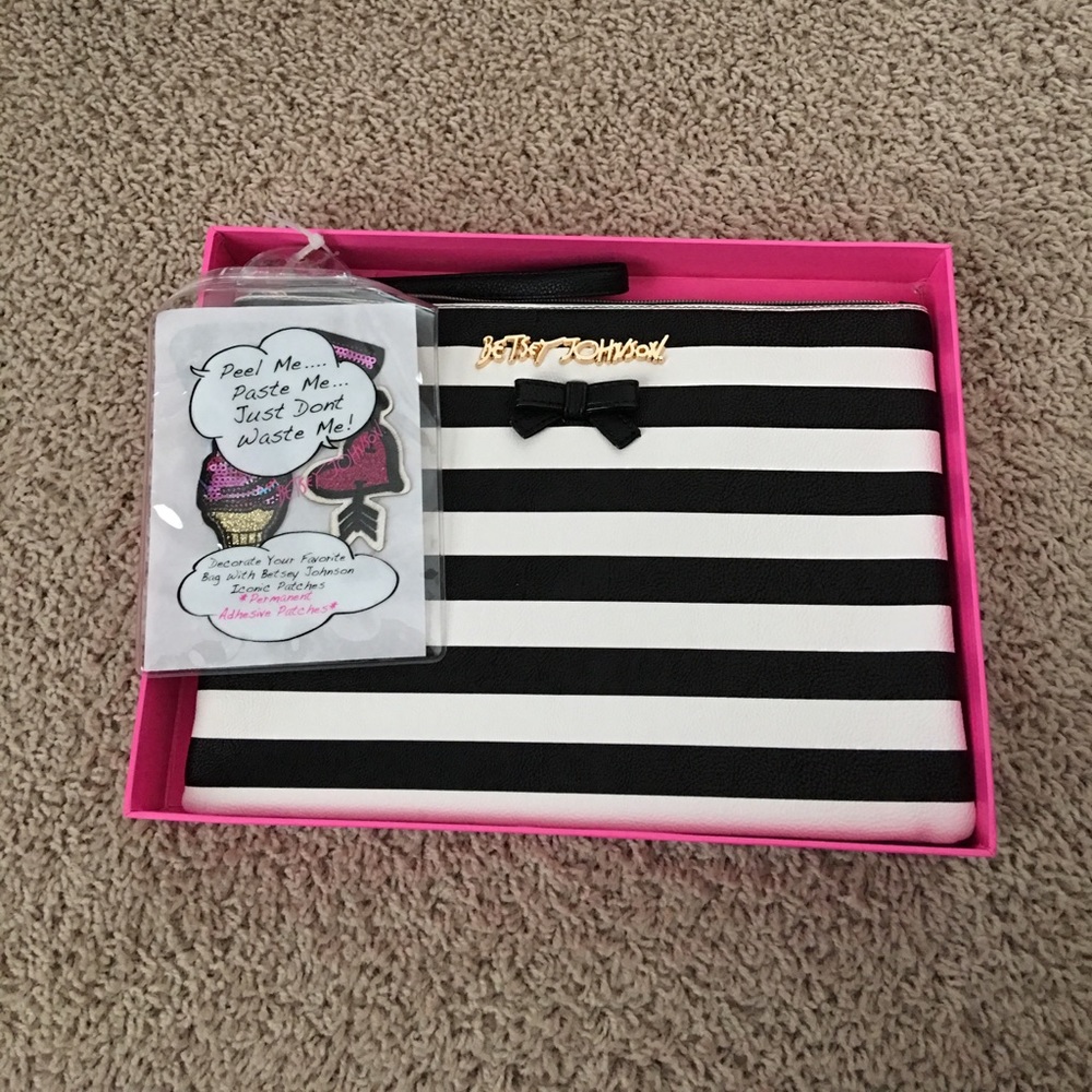 Betsey Johnson: large pouch with wristlet strap