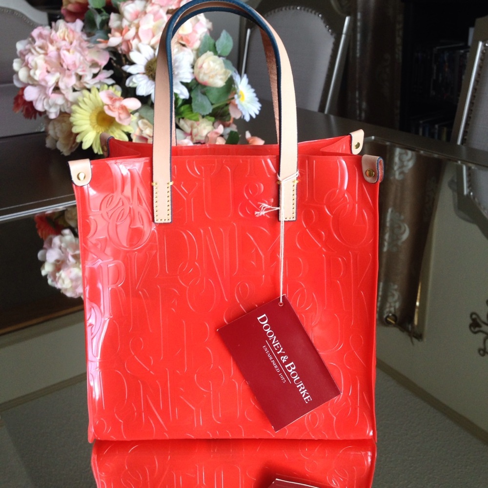 Dooney & Bourke embossed leather trim orange small