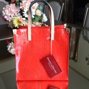 Dooney & Bourke embossed leather trim orange small