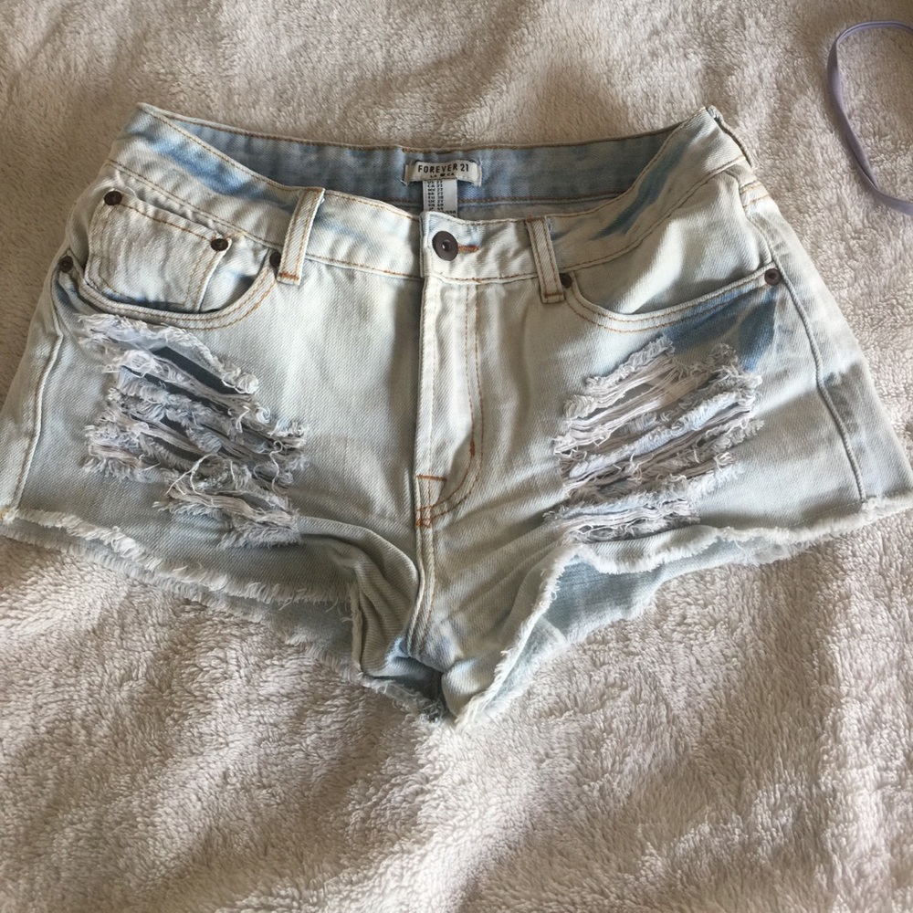 Ripped light wash jean shorts