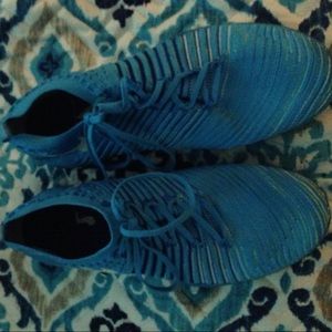 Blue and green Nike free nits