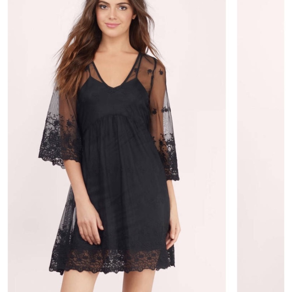 Black, partly sheer, lined lace dress