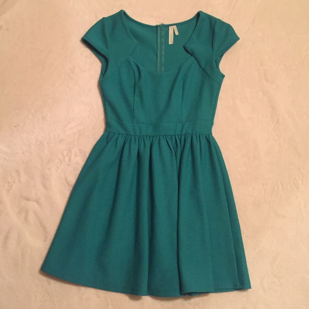 Green fit and flare dress / low cut