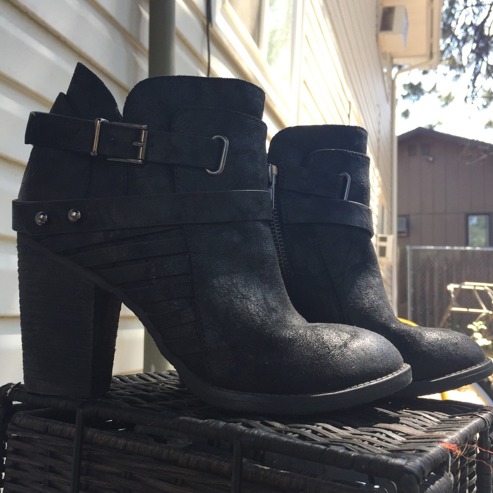 Not rated black booties