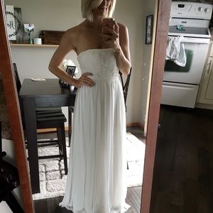 Strapless, floor length, white dress