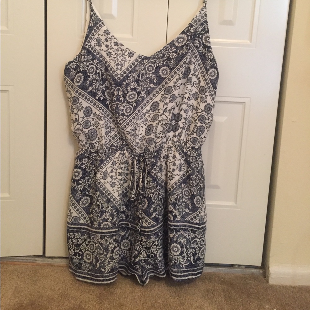 Blue and white patterned romper.