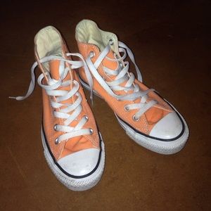 Orange high top converse sneakers