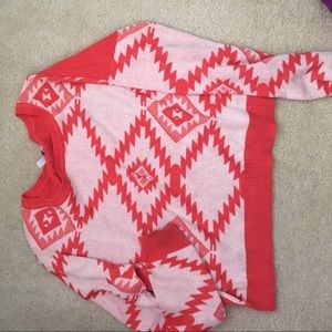 An xs coral sweater from Delia's!
