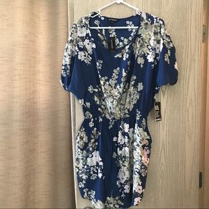 Brand new silky flower Express dress with pockets.
