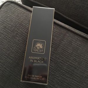 NIB Clinique ARomatics in black- 1.7ounces
