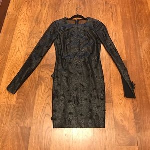 Black leather and sheer lace cocktail dress