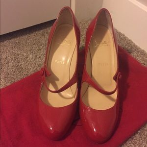 Red Louboutin Pumps