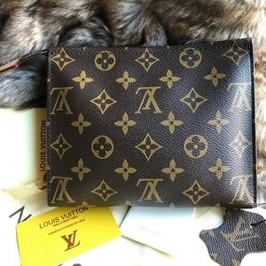 Louis Vuitton Monogram Canvas Trousse clutch