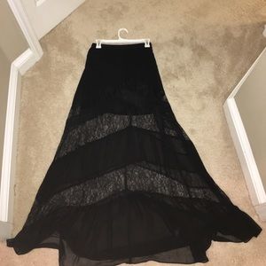 Black sheer maxi skirt with lace cutout stripes