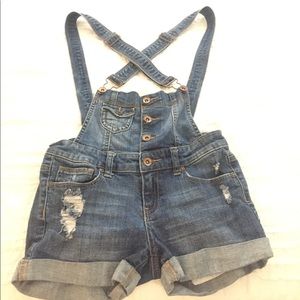 Specia A: denim overall shorts.