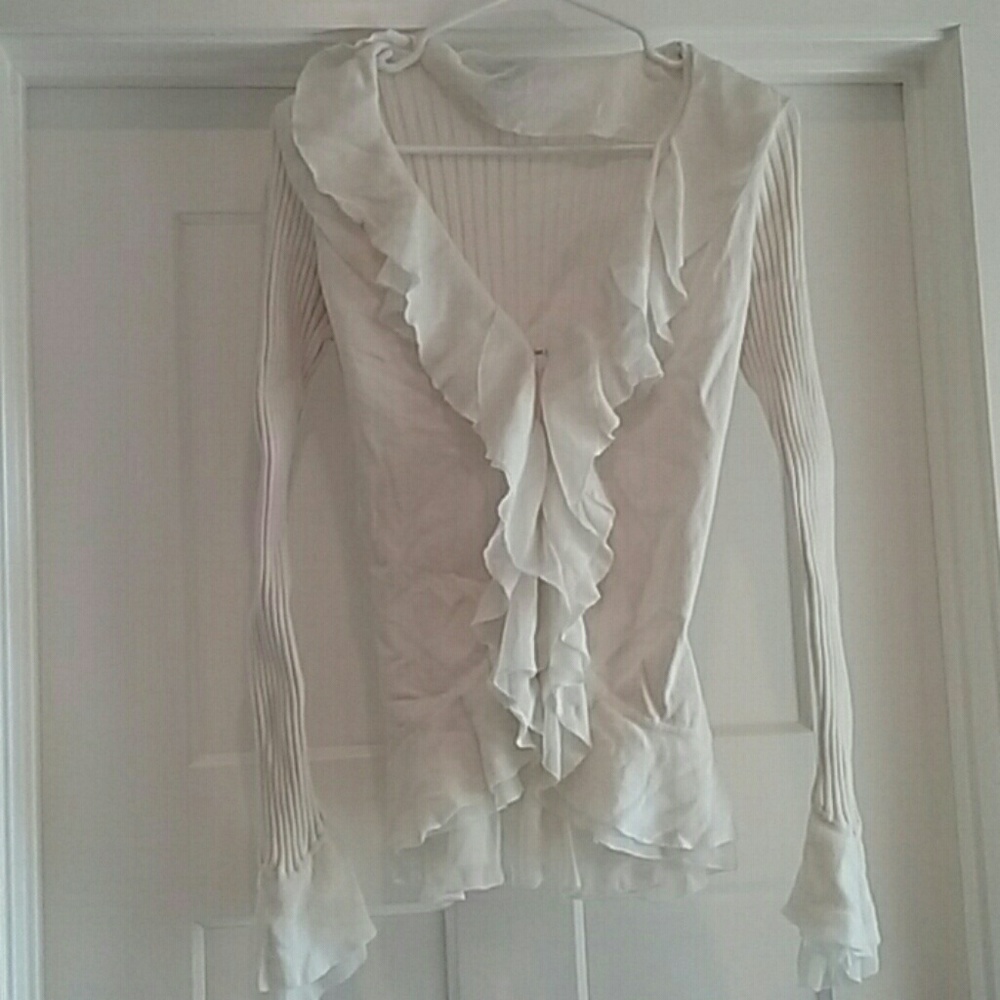 White sweater.