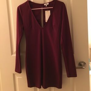 NWT Tobi dress. Sexy low cut and and open back