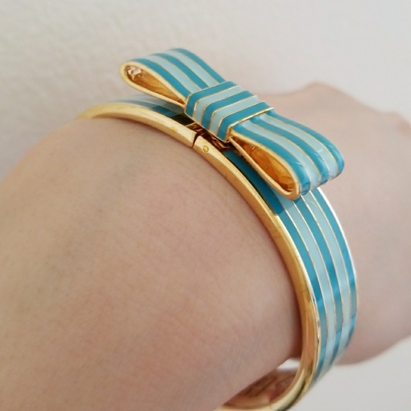 coach Jewelry - Coach Poppy Enamel Hinged Bow Bangle