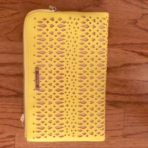 A cute yellow and tan clutch