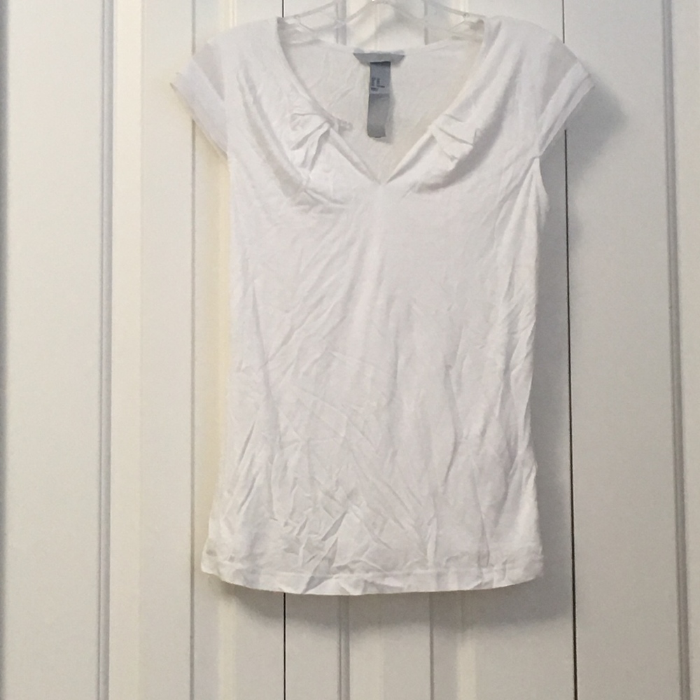 White Blouse with a Black Button