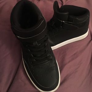 Black leather high tops