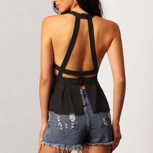 Open back peplum shirt