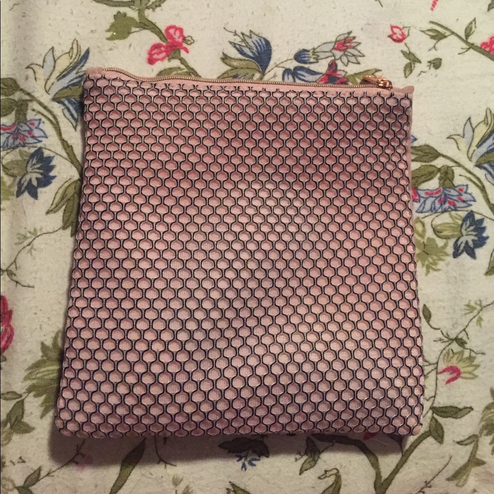 Light pink fenced makeup bag
