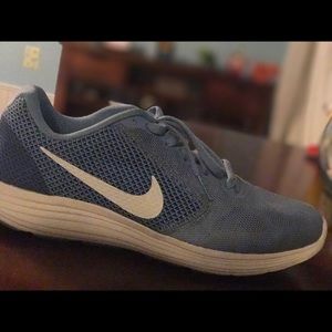 Light Blue Nike Revolution 3 Running Shoes.