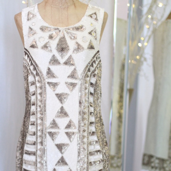 white and gold sequin dress