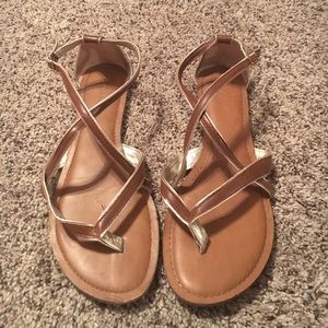 Brown and gold gladiator sandals