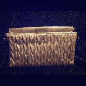 Gold clutch/small crossbody handbag.