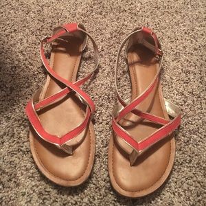 Orange and gold gladiator sandals
