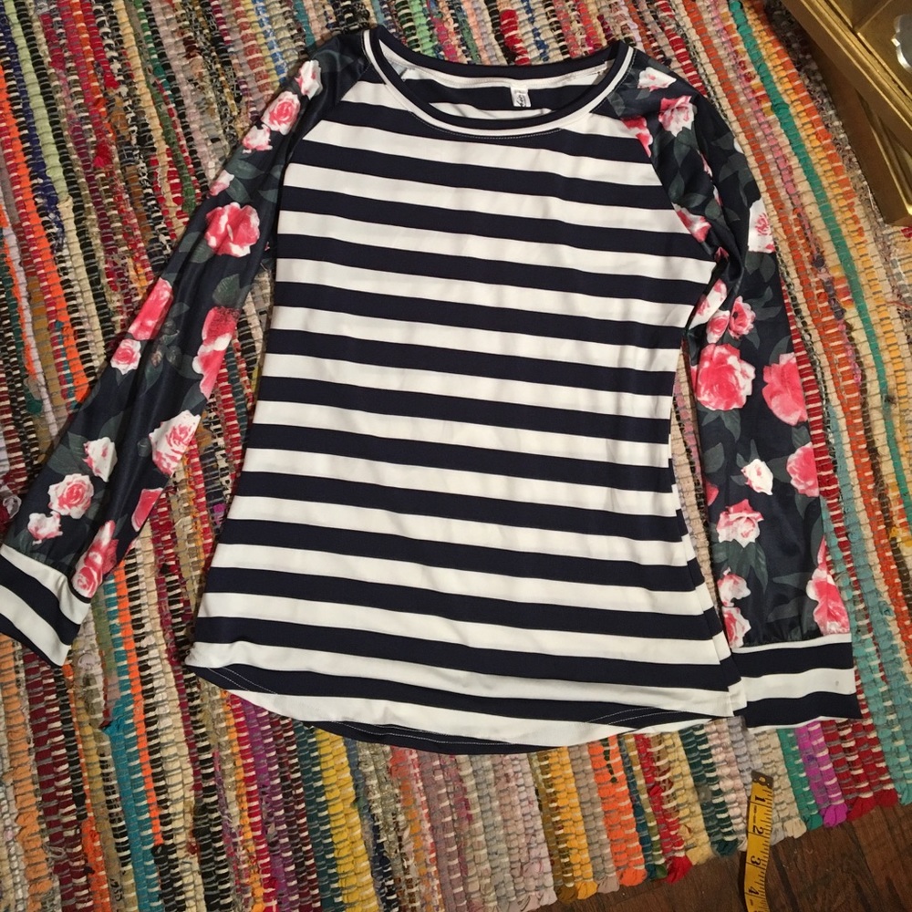 Never worn Stripped top L