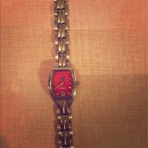 Watch- fossil with Texas tech face and date