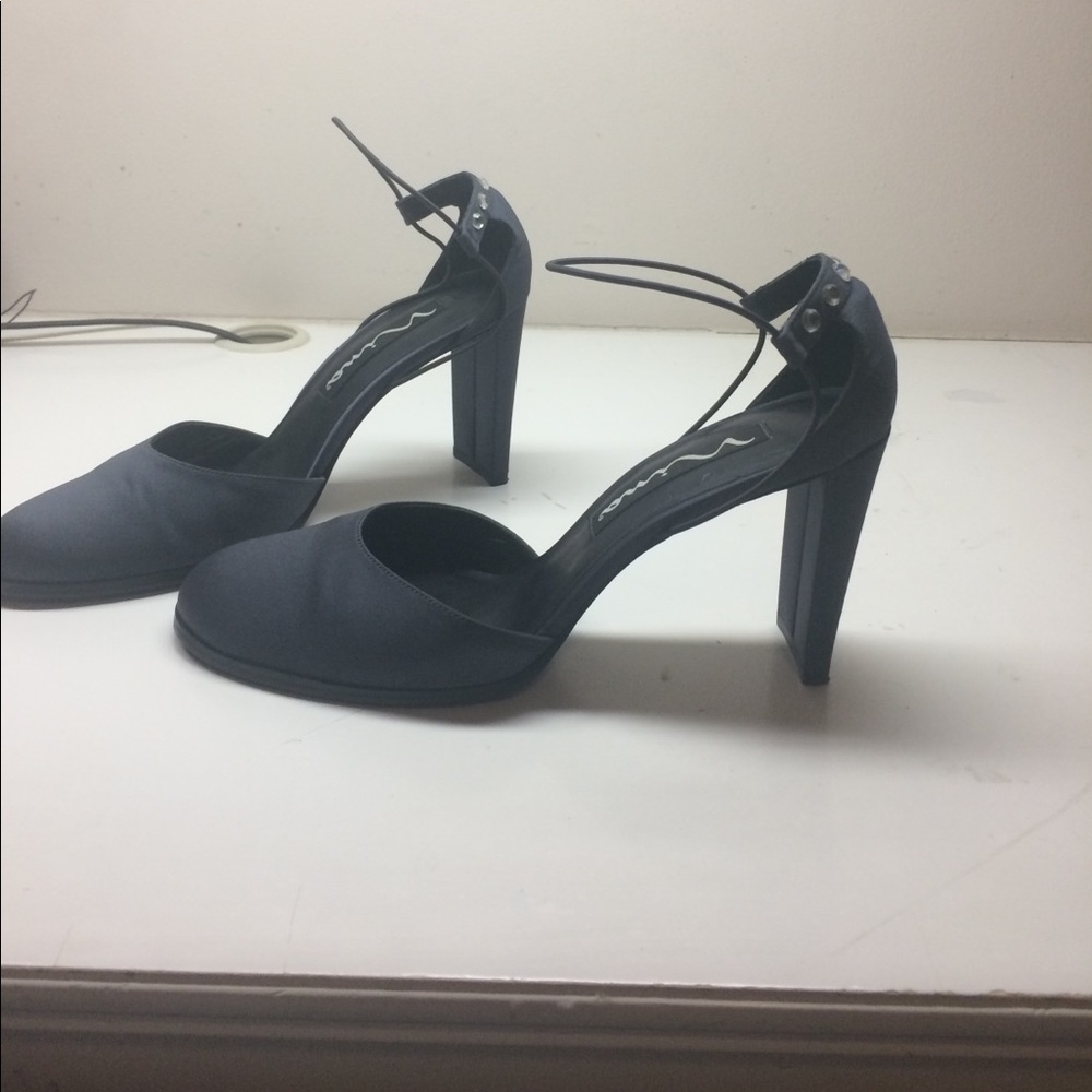 Black heels with rhinestones in the back