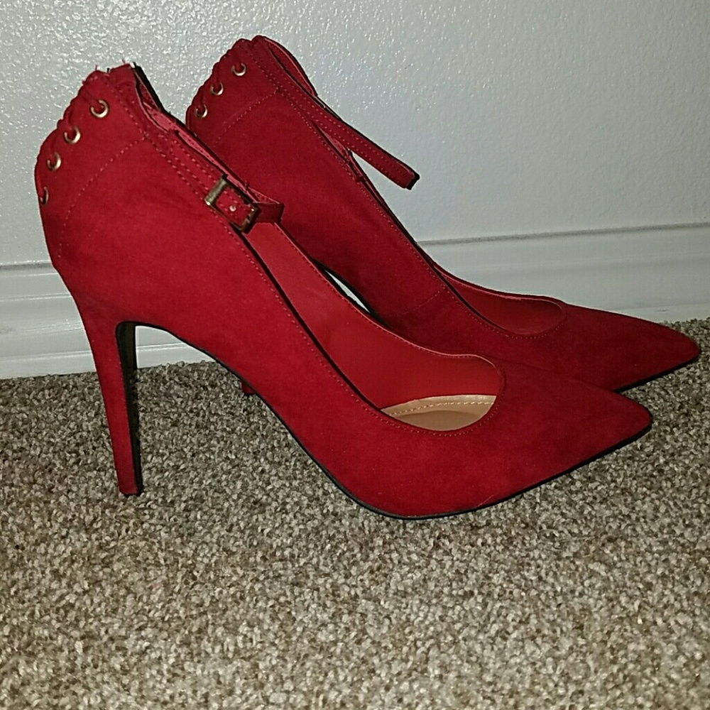 SOLD. Sexy red heels never worn