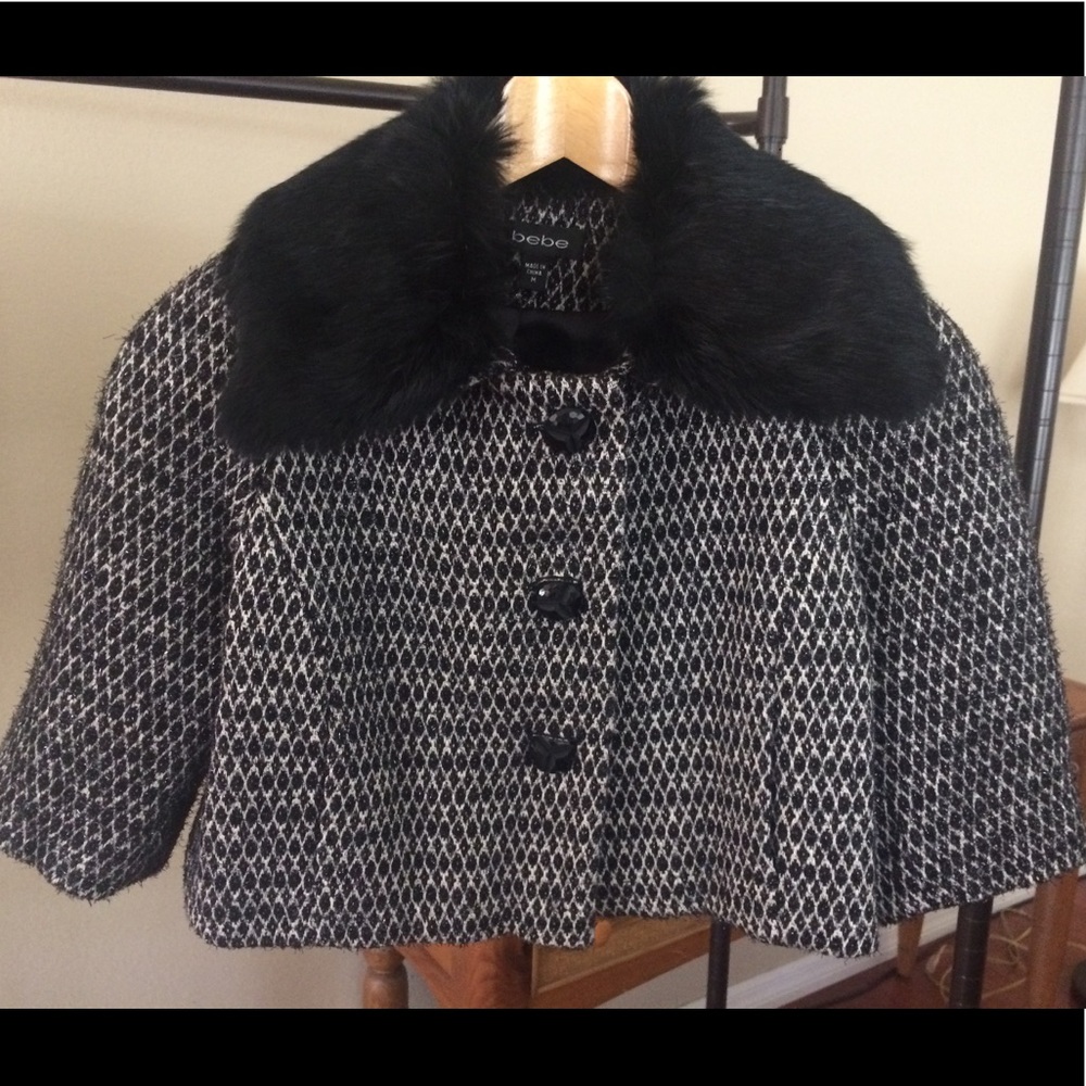 Short black jacket.