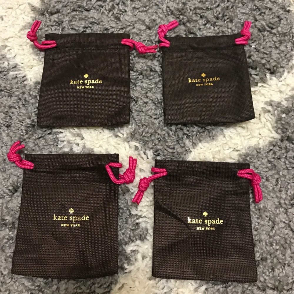 4 Kate Spade small cloth bags.