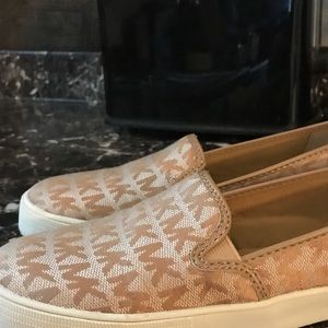 Michaels Kors slides on sneaks  loafers. Size 6"5