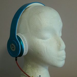 Light blue Beats solo HD over ear headphones