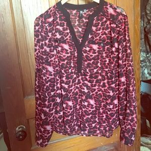 High low red and black print blouse. Size medium