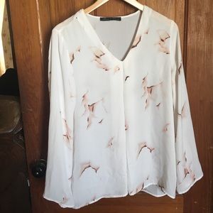 Beautiful sheer white with print blouse