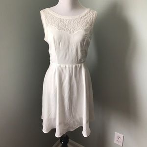 White dress with scallop detail