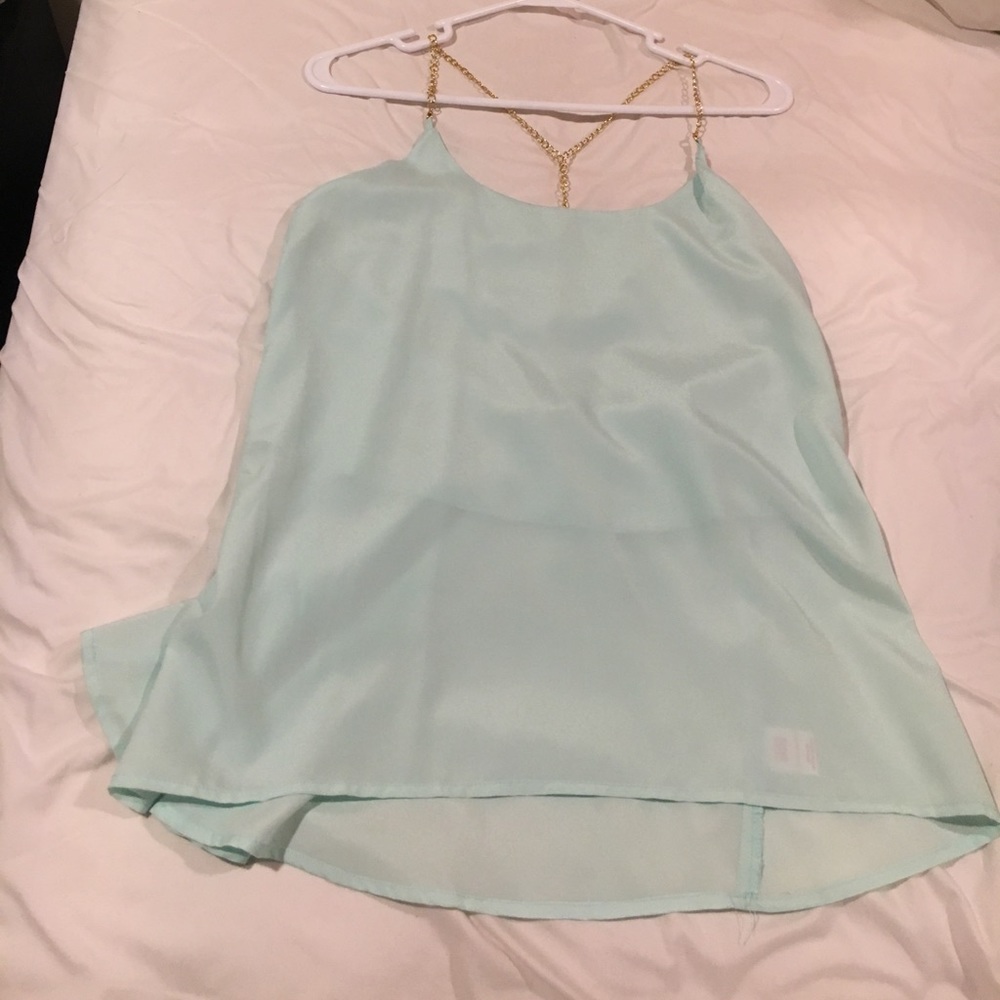 Light blue top with gold chain straps