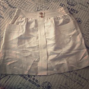 Soft smooth cream skirt w hidden buttons up front