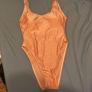 Nude one piece swim suit